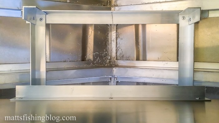 front of rod locker past front seat